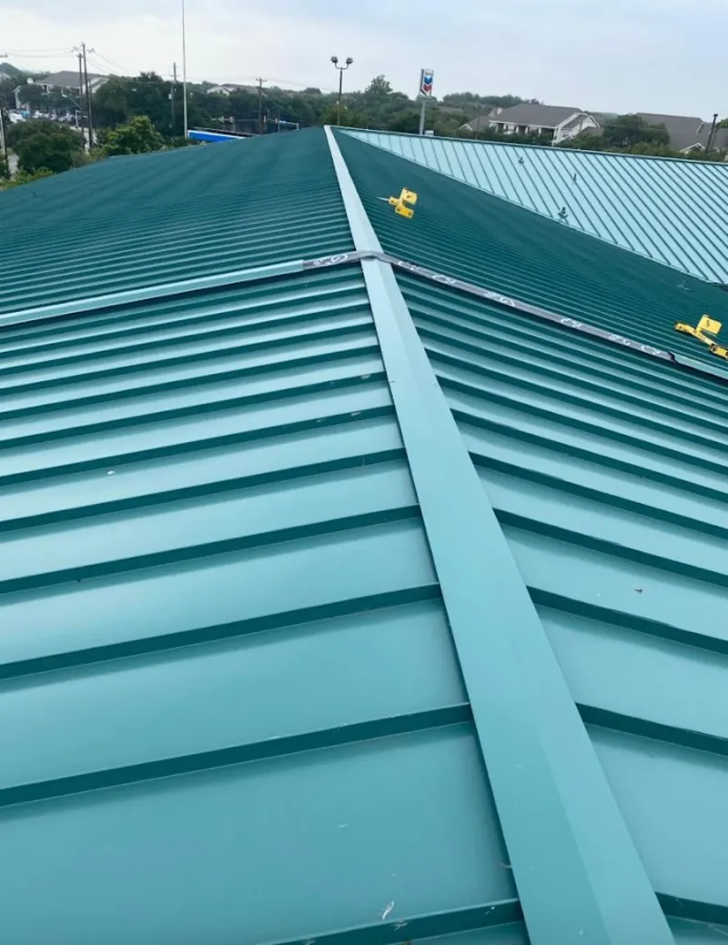 Green commercial metal roof ridge and valley for Metal Roof Repair in Headland